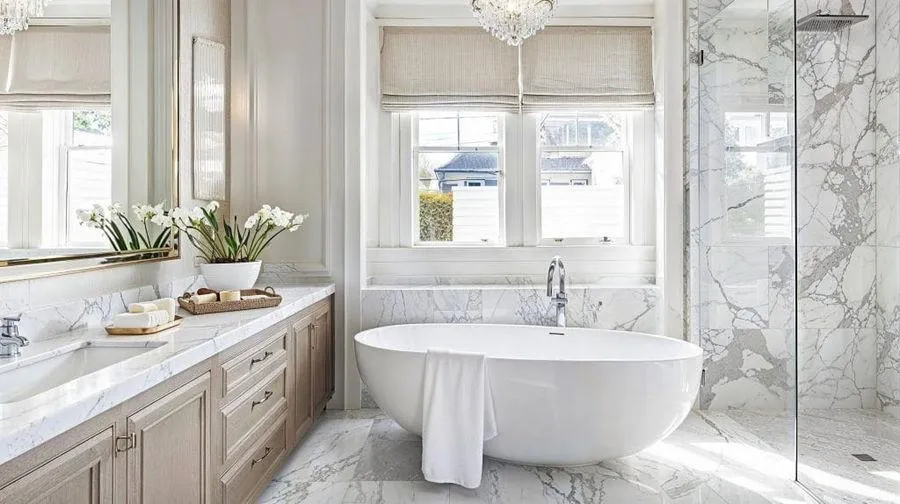 Renovated bathroom with a luxurious feel, showcasing high-end finishes and fixtures.