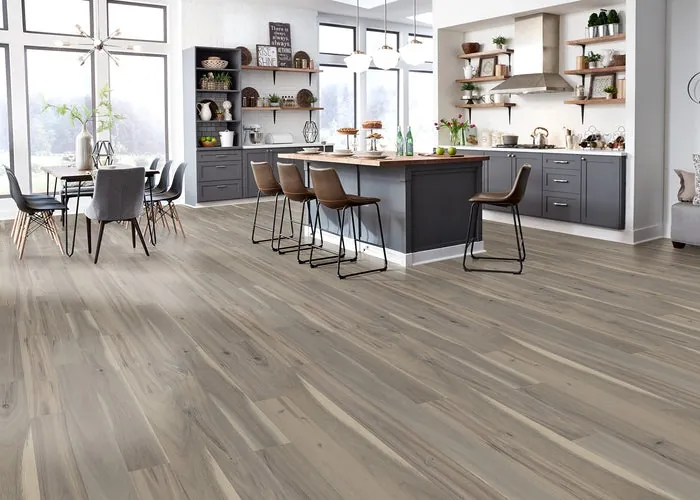 Hardwood flooring features visible grain and a matte finish across a clean, even installation.