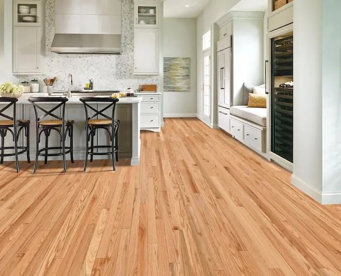 Hardwood flooring features a consistent pattern across a clean, even installation.