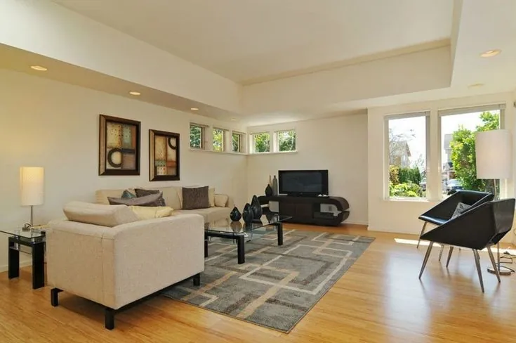 Hardwood flooring features a diagonal layout and visible grain across a clean, even installation.