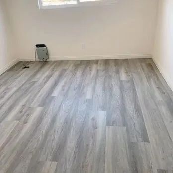 Laminate flooring shows a consistent pattern across the installed area.