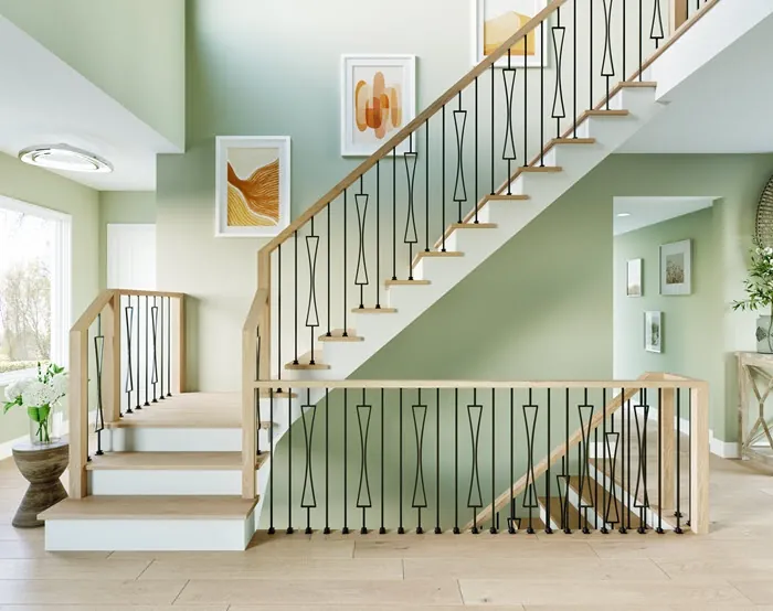 Staircase railing with black metal accents.