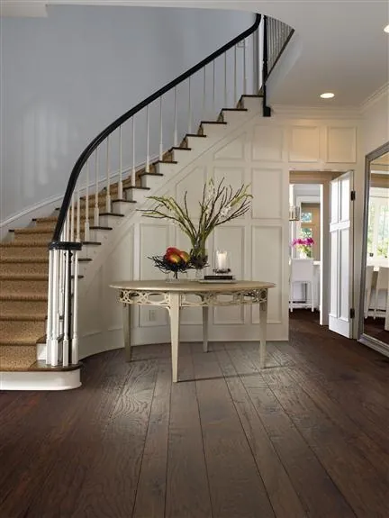 Vinyl plank flooring shows visible grain and a consistent pattern across the installed area.