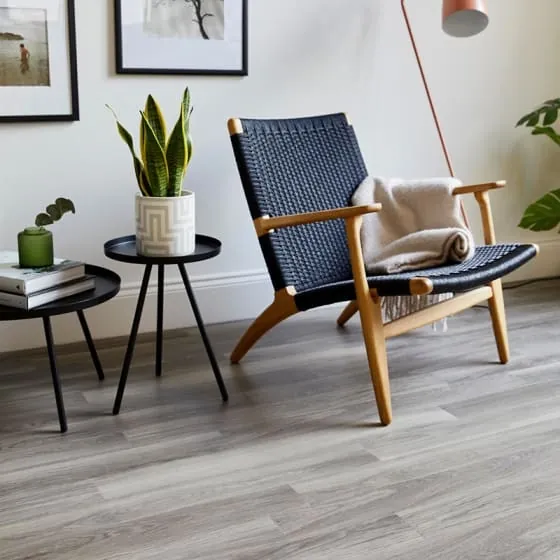 Vinyl plank flooring shows a diagonal layout and visible grain across the installed area.