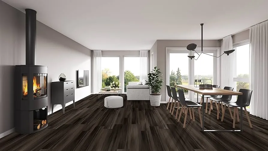 Dark wood-look vinyl planks in a herringbone pattern.