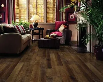 Vinyl plank flooring shows a diagonal layout and a consistent pattern across the installed area.
