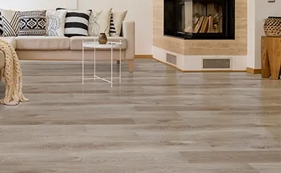 Vinyl plank flooring shows consistent plank alignment and a clean fitted finish across the installed area.
